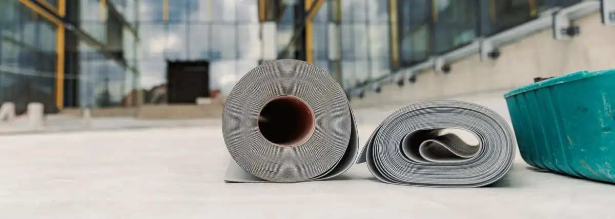 Rolls of roofing materials.